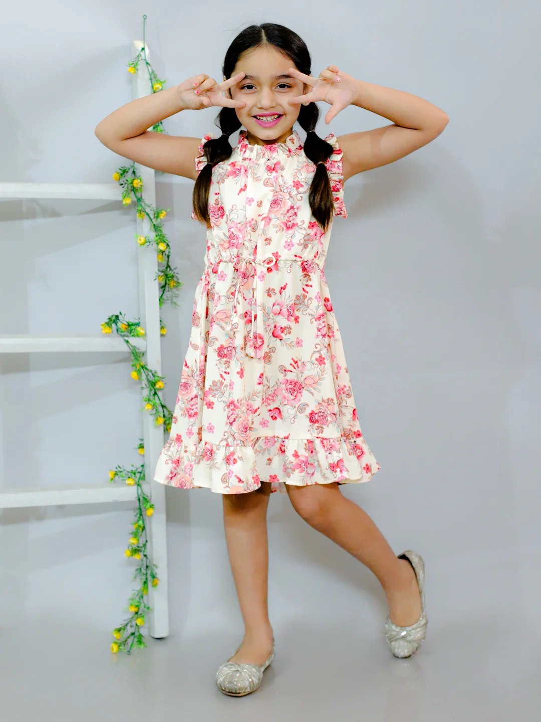 Sleevless all over printed A-Line knee length dress comes with flared hem Beige