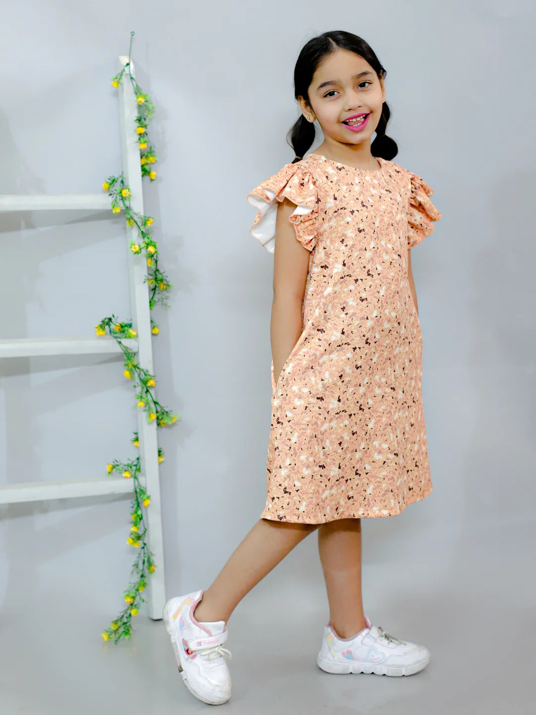 Flared sleeves all over printed A-Line knee length dress comes with concealed pockets yellow view 2