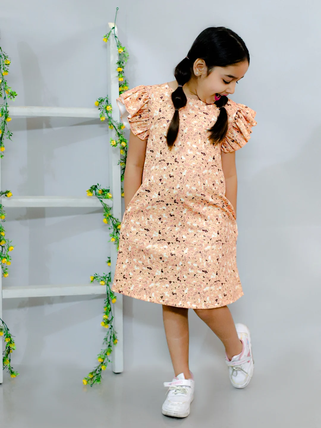 Flared sleeves all over printed A-Line knee length dress comes with concealed pockets yellow view 3